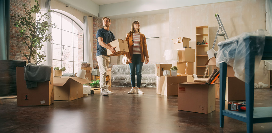 Family New Home Moving in: Happy and Excited Young Couple Enter