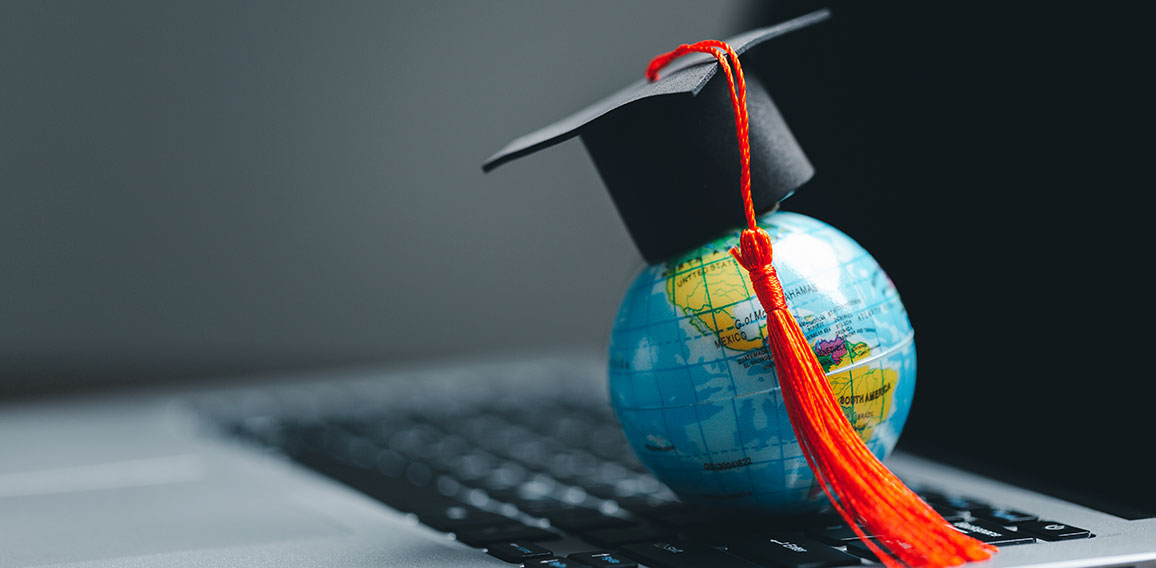 Graduation cap with Earth globe. Concept of global business study, abroad educational, Back to School. Education in Global world, Study abroad business in universities in worldwide. language study