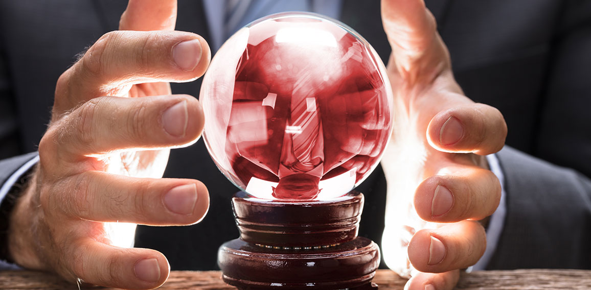 Midsection Of Businessman Covering Crystal Ball