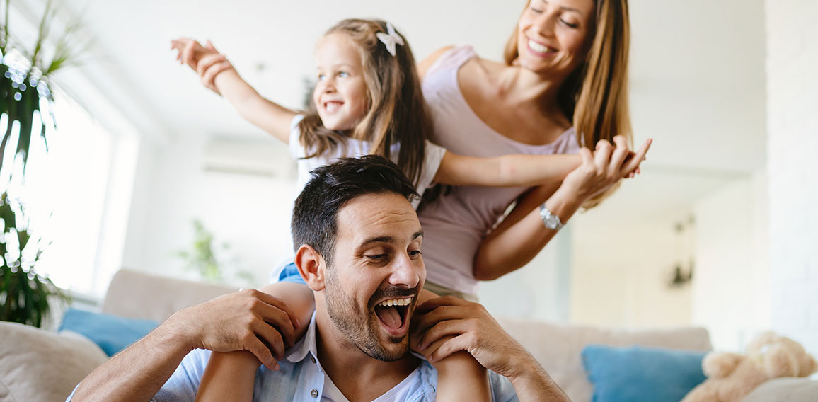 Happy family having fun times at home