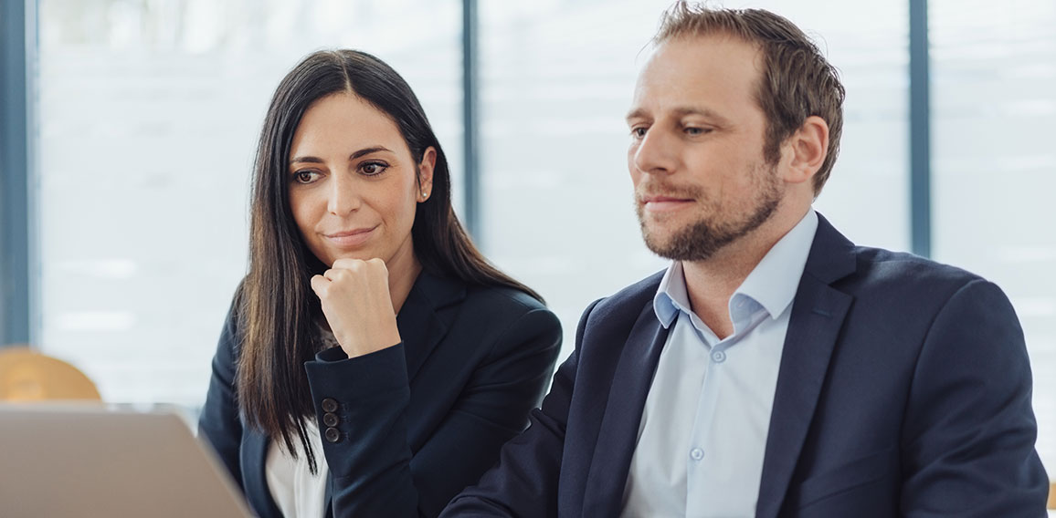 stylish businessman and woman working together