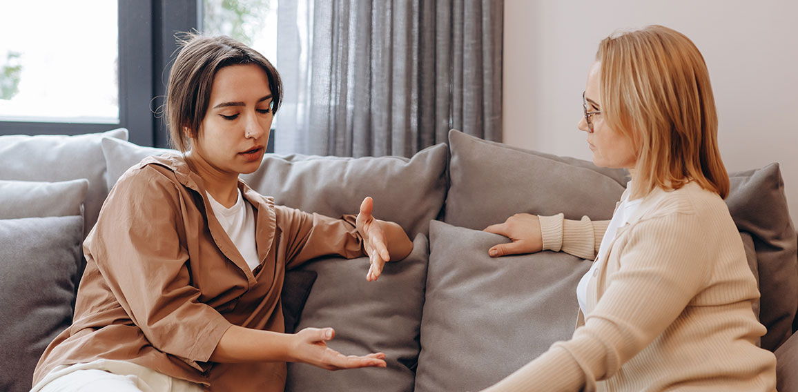 A young woman in a consultation with a professional psychologist