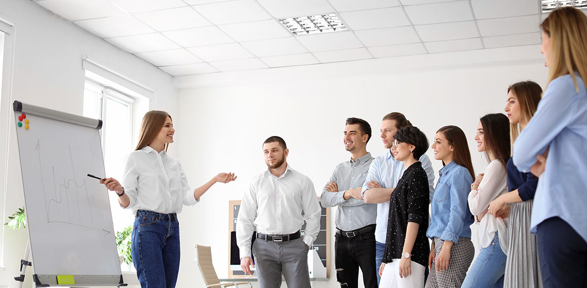 Female business trainer giving lecture in office