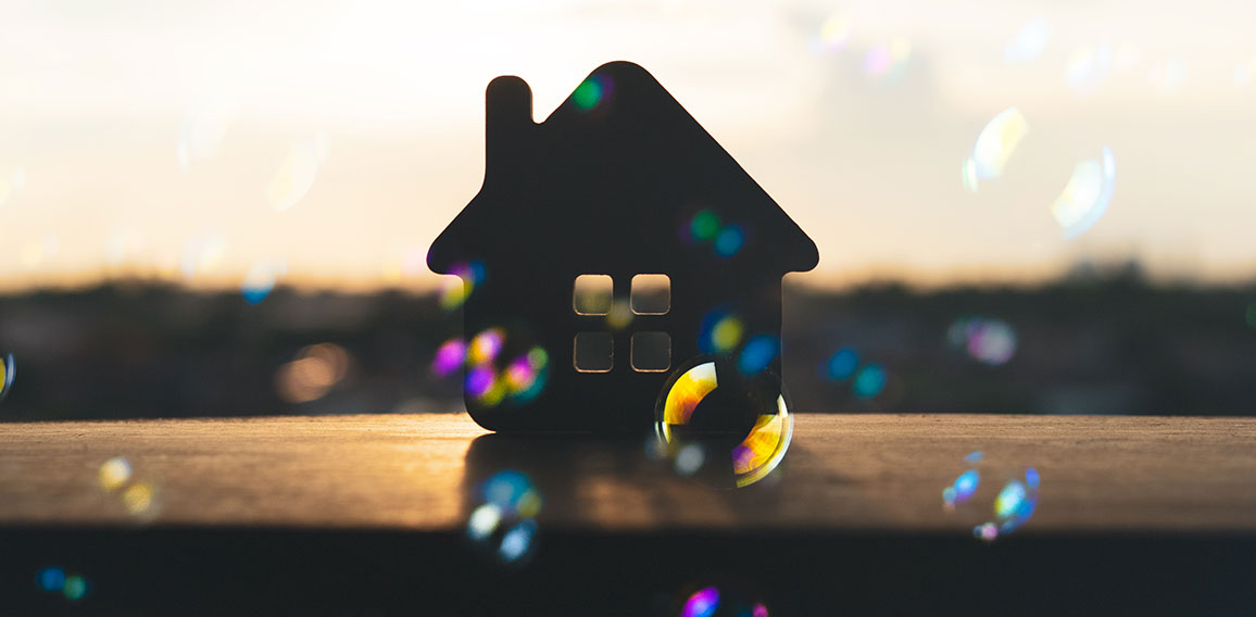 House model on black table with many bubble and black background