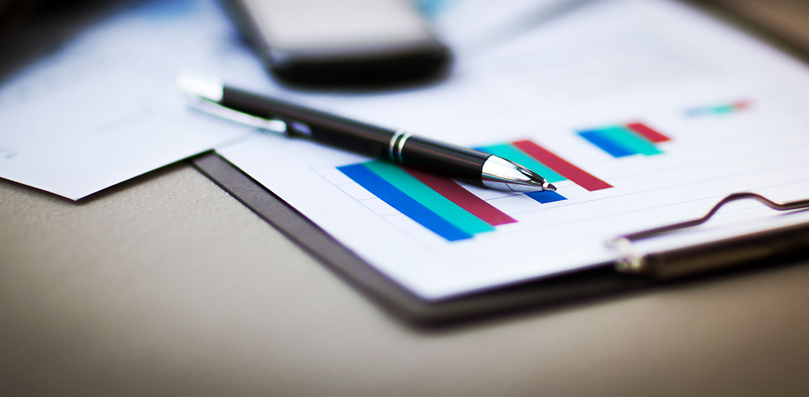 financial charts and graphs on the table