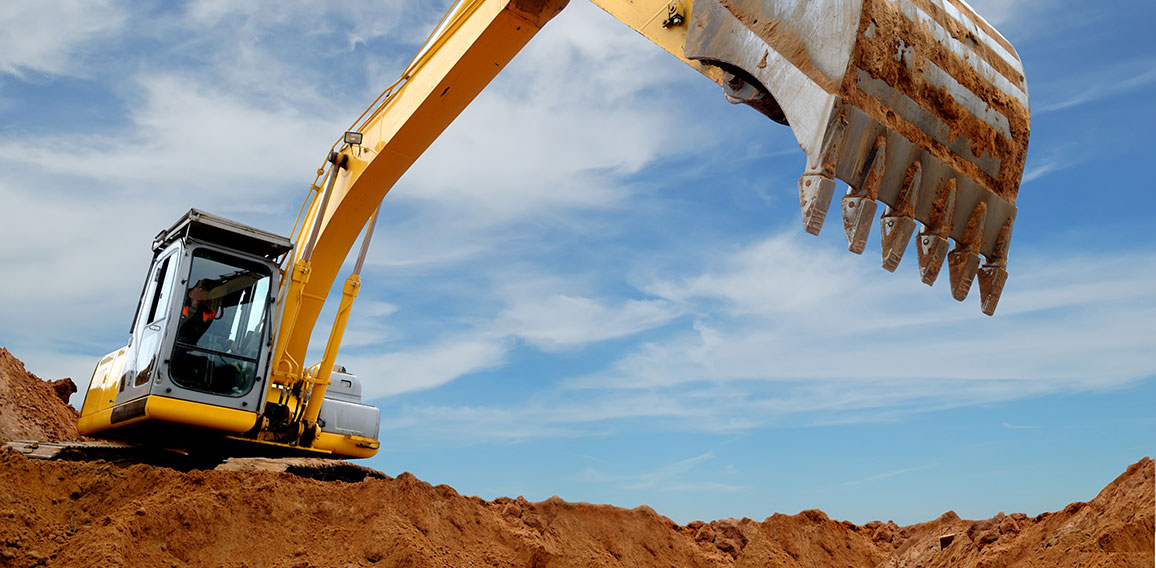 Excavator loader in sandpit