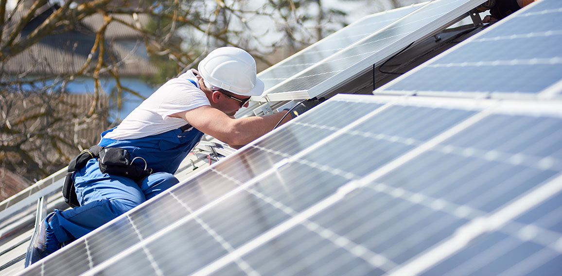 Installing solar photovoltaic panel system on roof of house