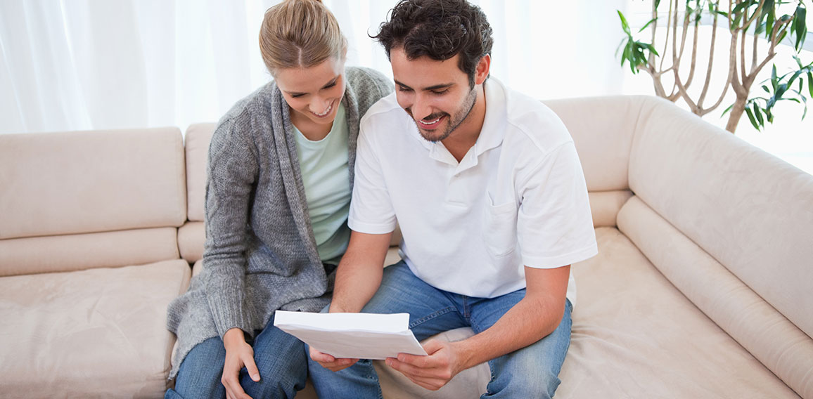 Couple reading a letter