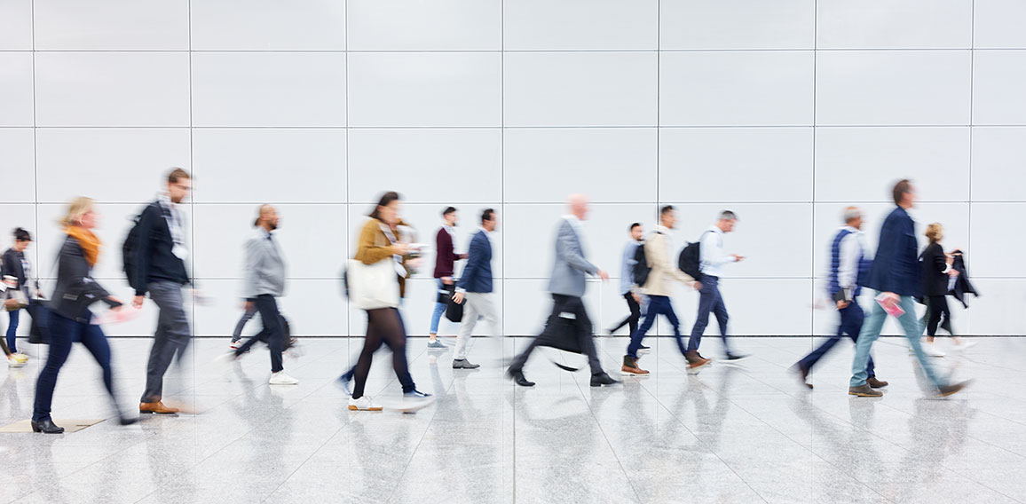 Anonymous crowd of business people on trade fair