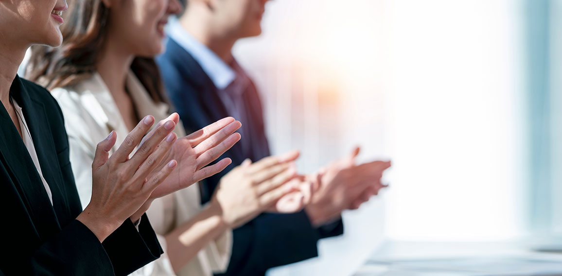 Business people applauding. Group of business people clapping in