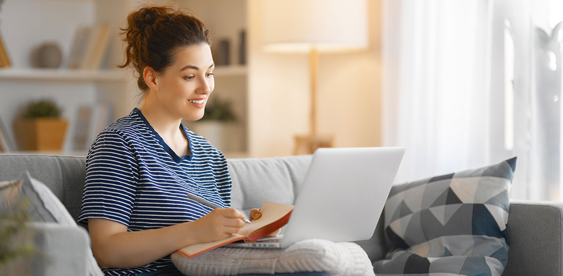 woman working on laptop at home