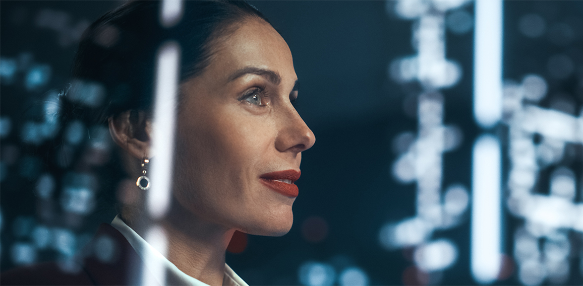 Successful Businesswoman in Stylish Suit Working on Top Floor Of