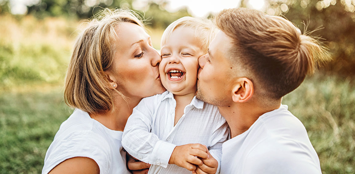 Young family with little son have fun outdoor