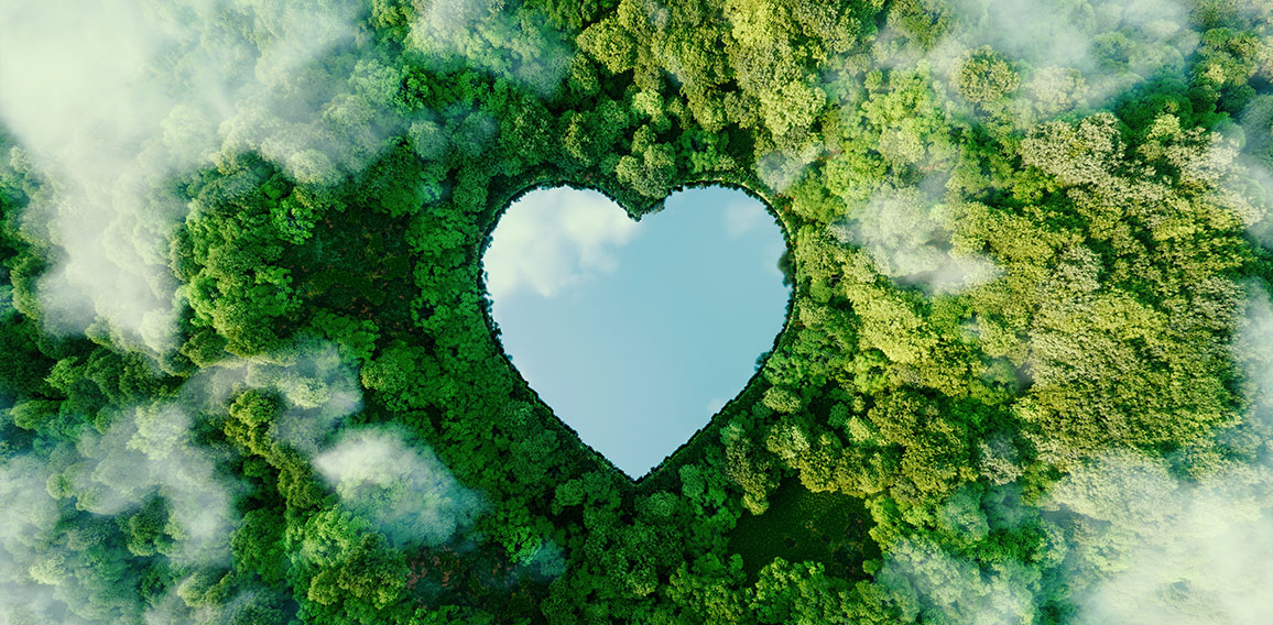 A heart-shaped lake in the middle of untouched nature - a concep