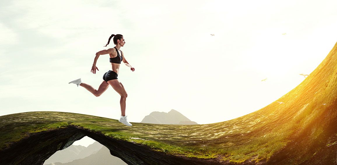 Woman running against natural landscape background