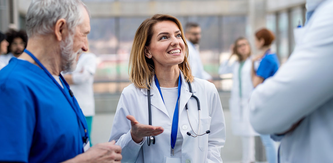 Group of doctors on conference, medical team discussing issues.