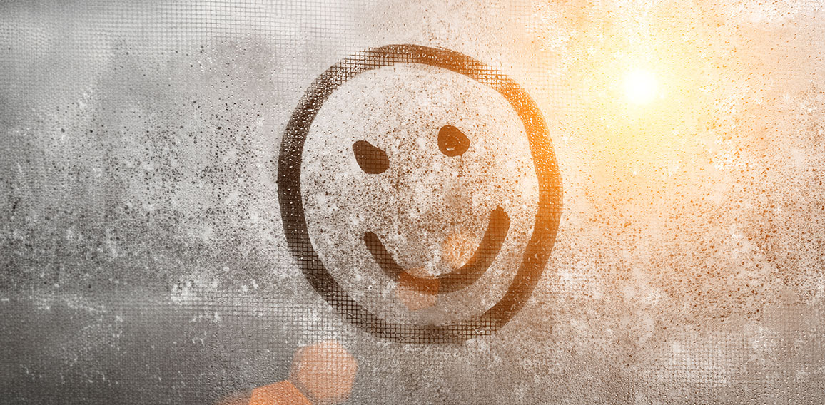 Emoji smile, Autumn rain, inscription on sweaty glass smiley with copy space for text