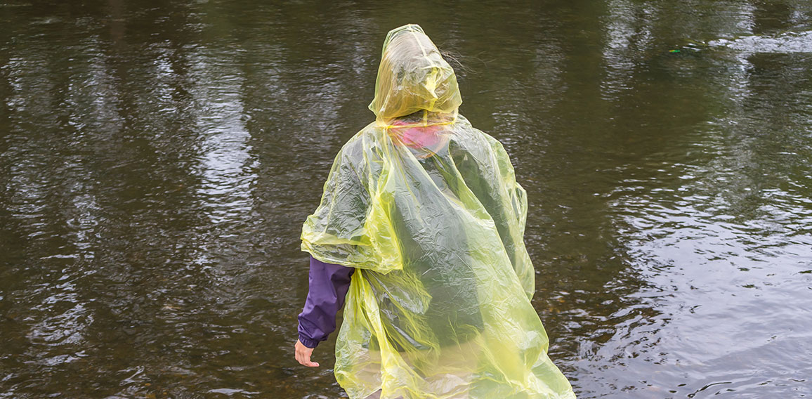 Woman with Rain Coat in the Rain