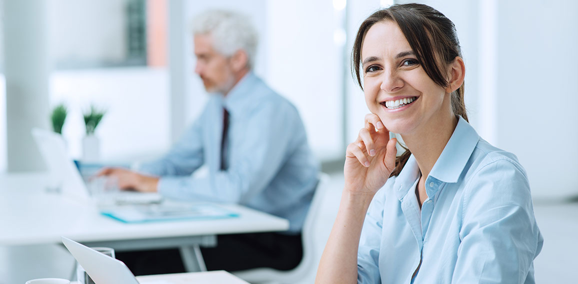 Smiling business woman at work