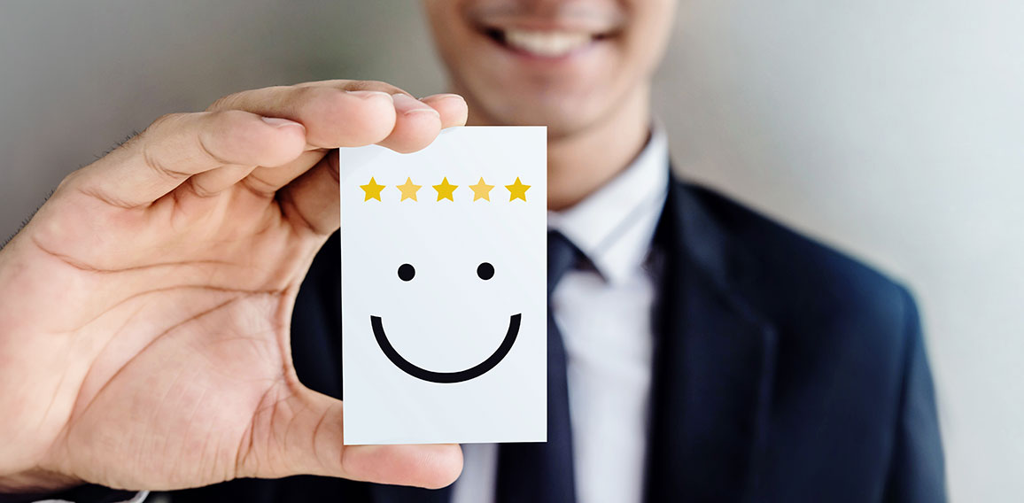 Customer Experience Concept, Happy Businessman holding Card with