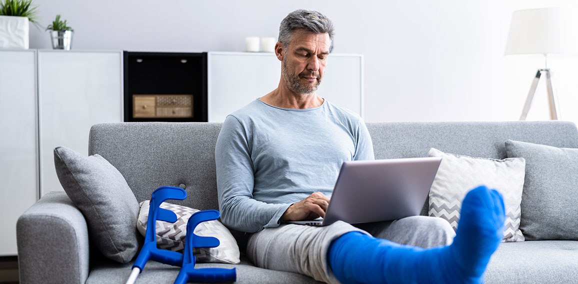 Injured Man With Broken Leg