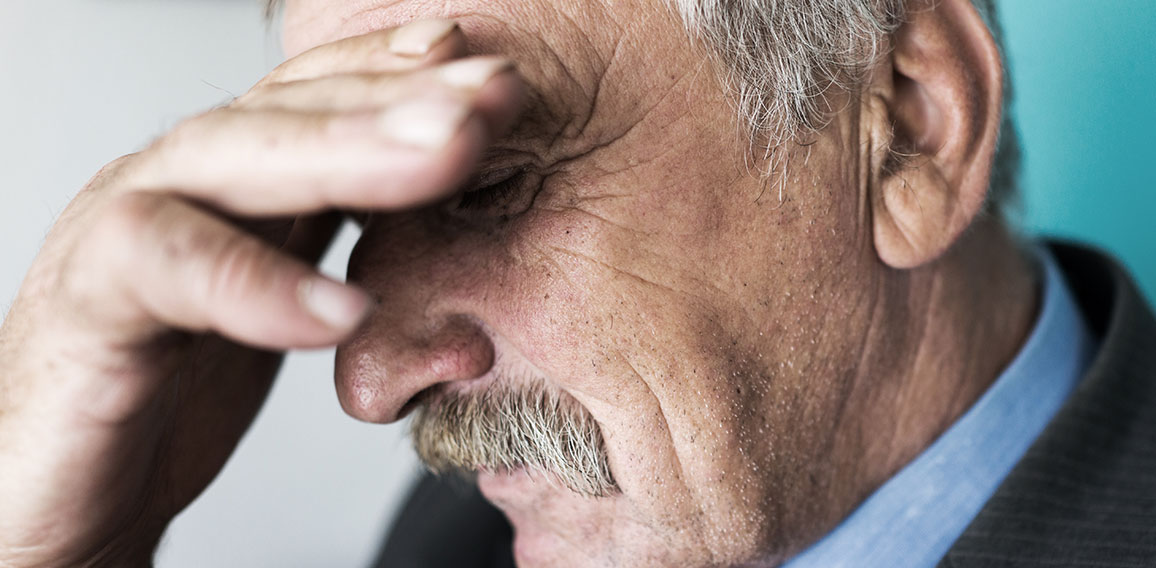 Senior depressed businessman thinking about worries