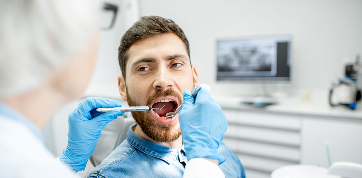 Man during the dental examintaion