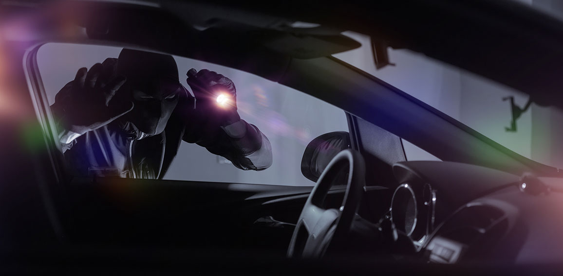 Car Robber with Flashlight