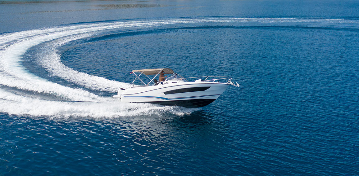 Aerial view of speed motor boat on open sea