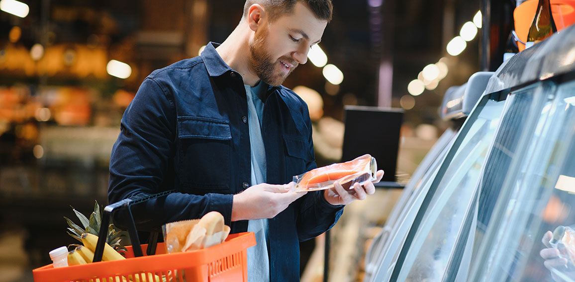 Man shopping in a supermarket