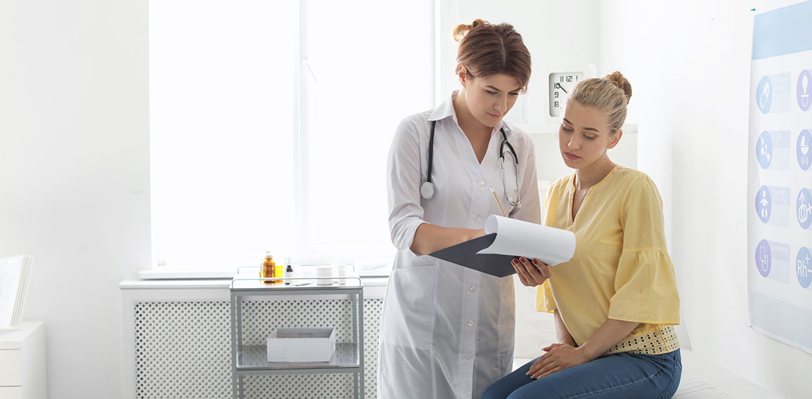 Patient having appointment with doctor in hospital