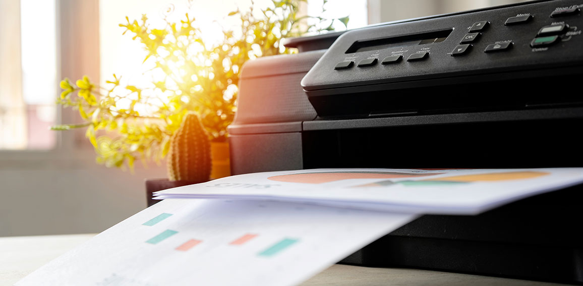 The printer is fully functional,Located on the desk.