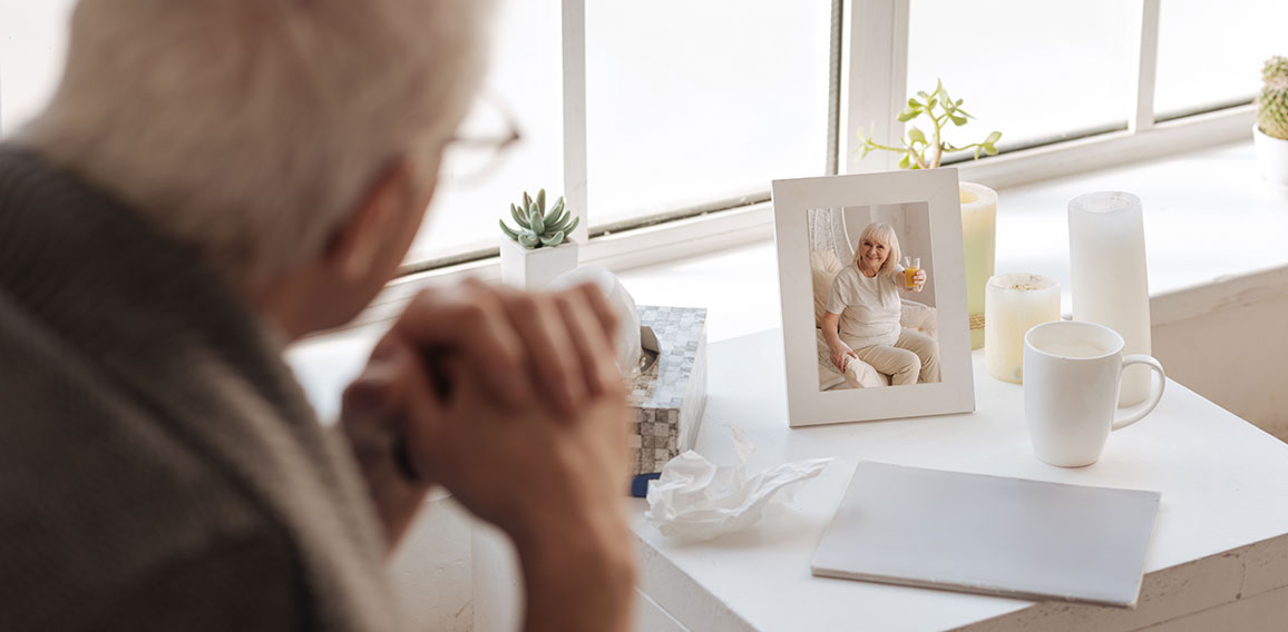 Selective focus of a photo standing on the bedside table