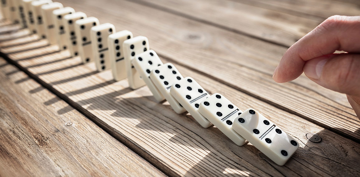 Stop the domino effect concept for business solution and interve