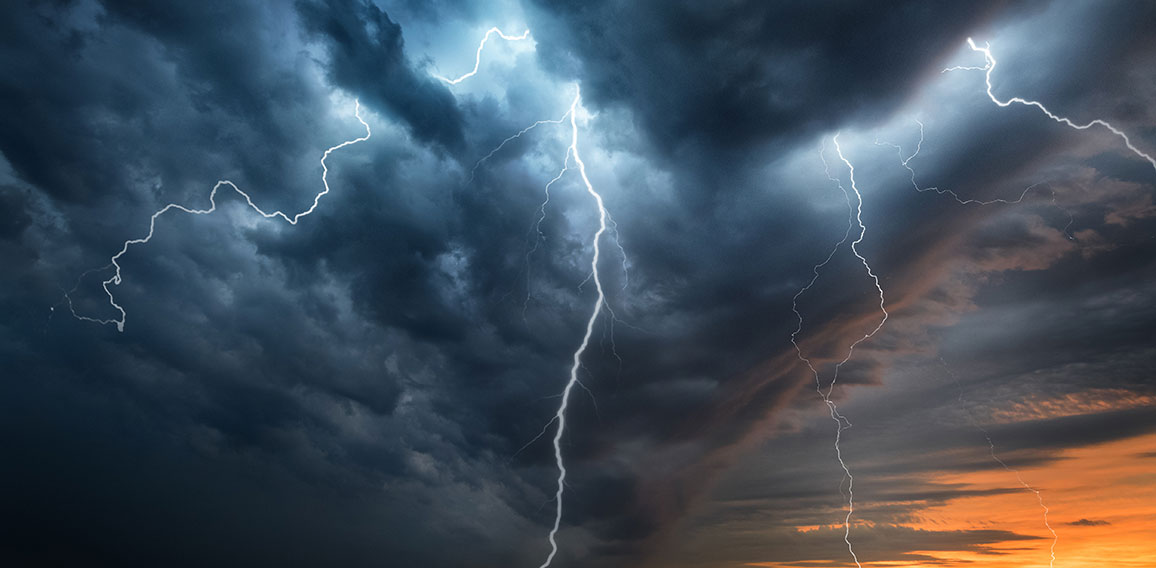 Lightning thunderstorm flash over the night sky. Concept on topi