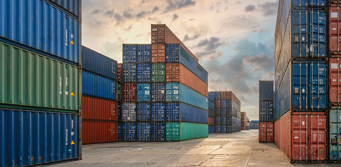 perspective view of containers at containers yard with forklift