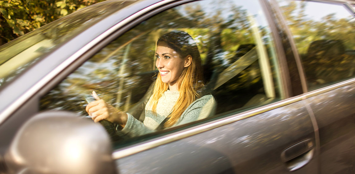 Woman driving car