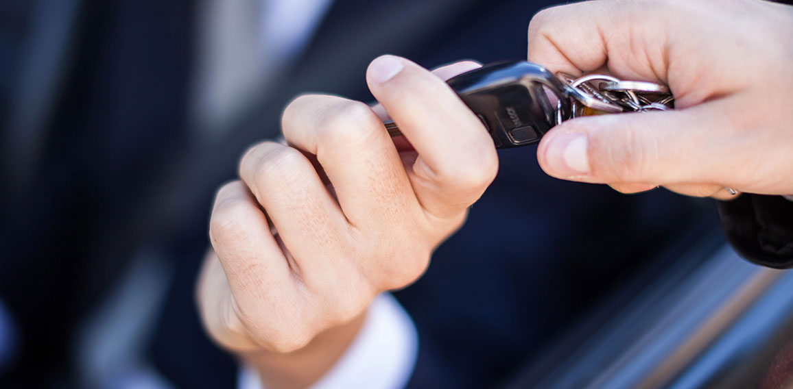 Man taking car key