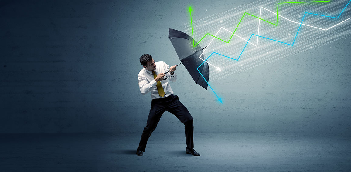 Business person with umbrella and stock market arrows concept