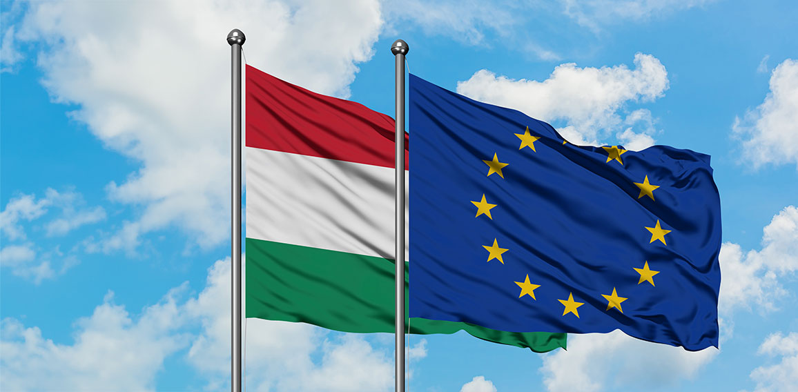 Hungary and European Union flag waving in the wind against white