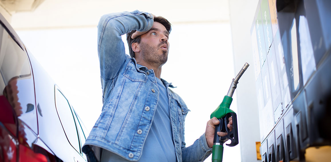 man in shock with gas price