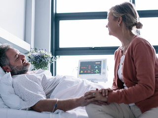 Wife visiting husband in hospital