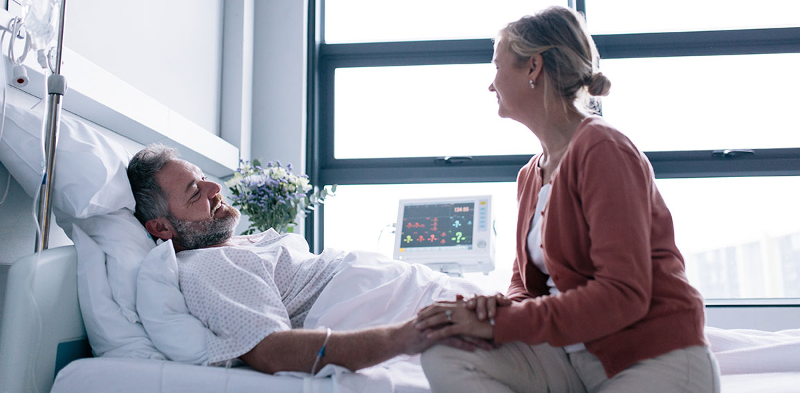 Wife visiting husband in hospital