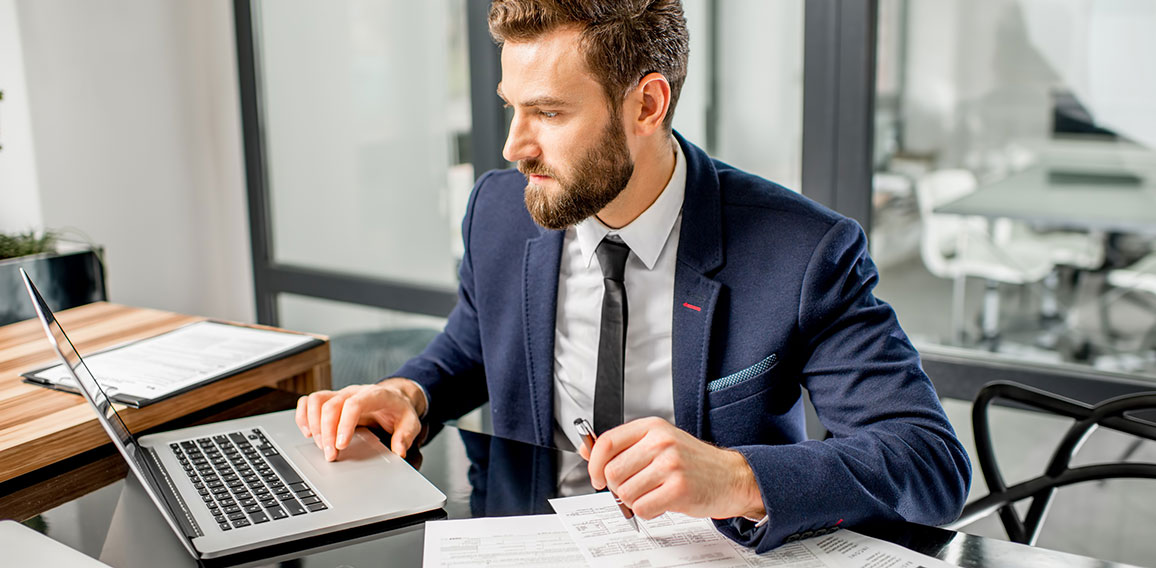 Tax manager working at the office